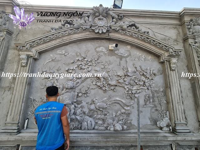 tranh đắp phù điêu nổi xi măng