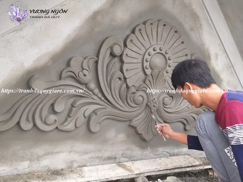 tranh đắp phù điêu nổi xi măng